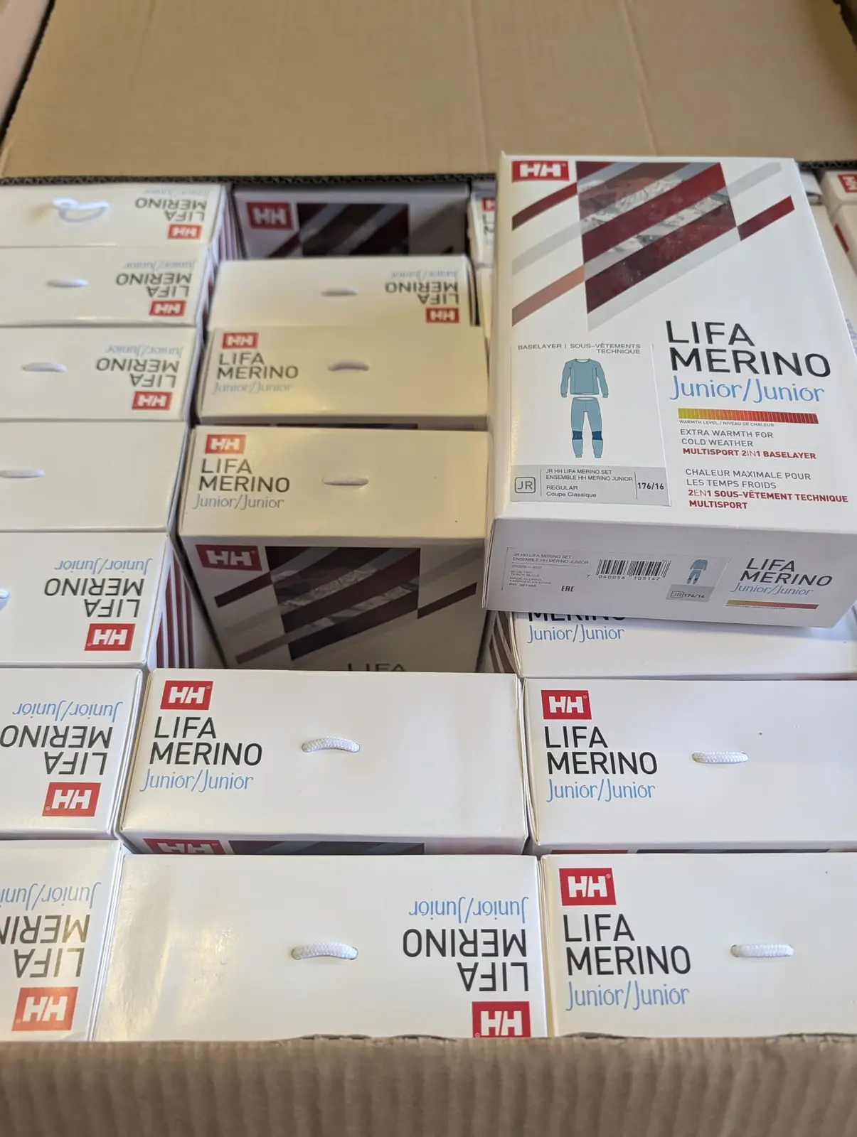 Komplety odzieży termicznej Helly Hansen LIFA Merino Junior w opakowaniach